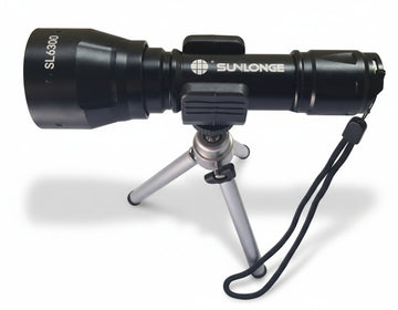 Black flashlight with a tripod attachment on a white background, branded 'Sunlance'.